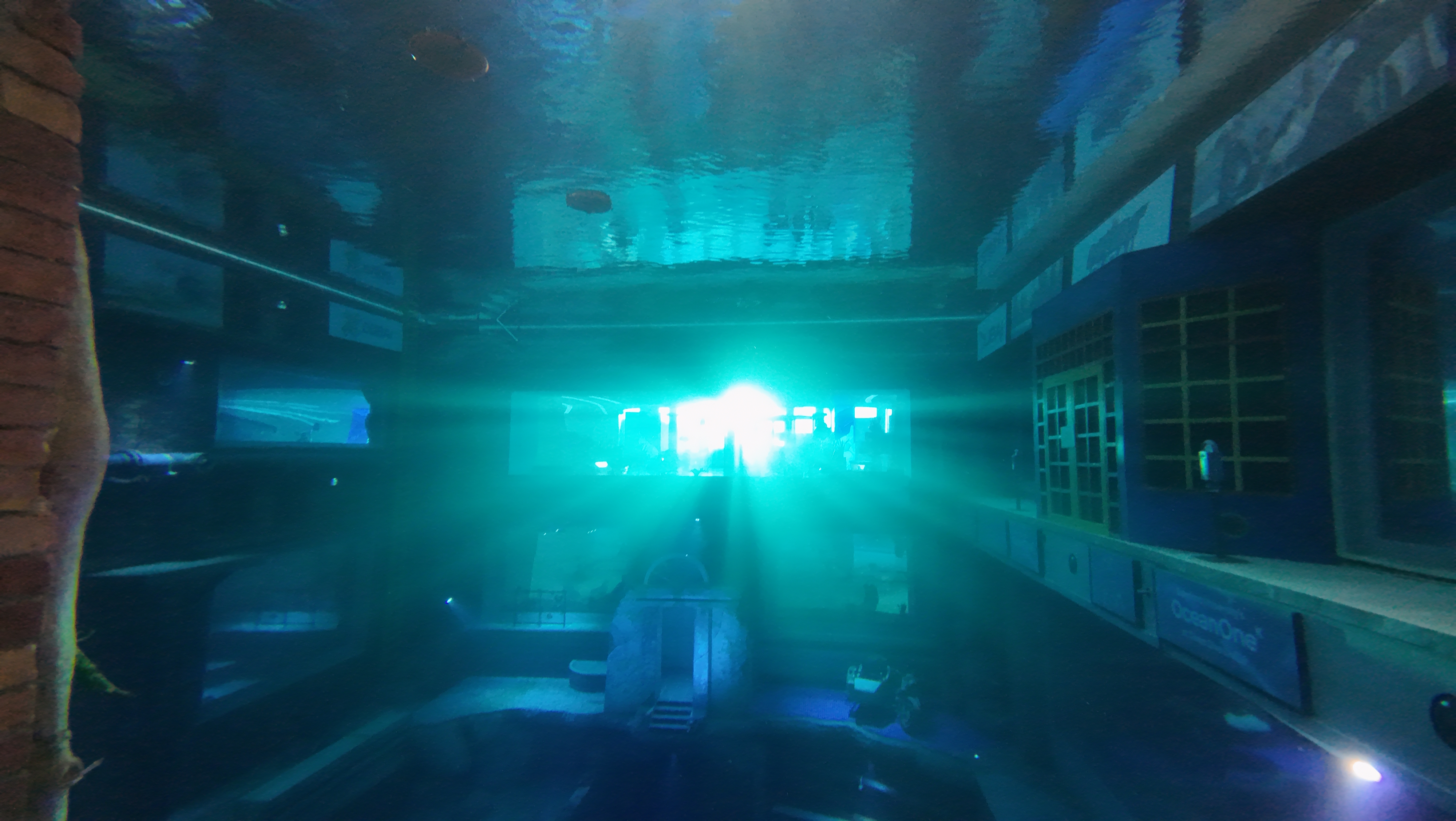 Light beams through the water at Deep Dive Dubai